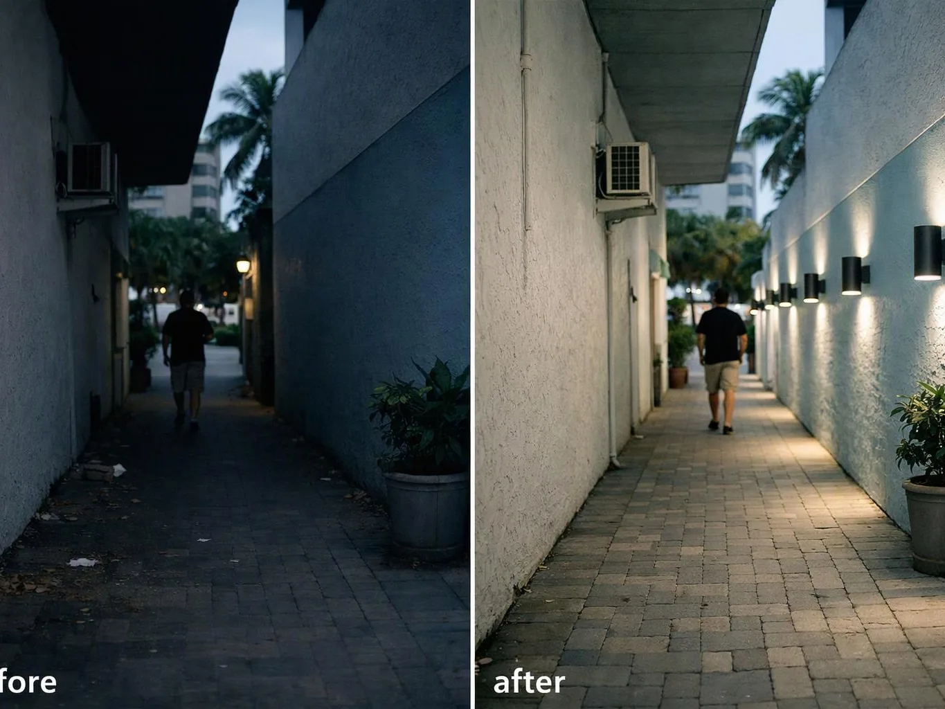 A man walks down a narrow outdoor corridor, shown dark on the left and brightly lit on the right